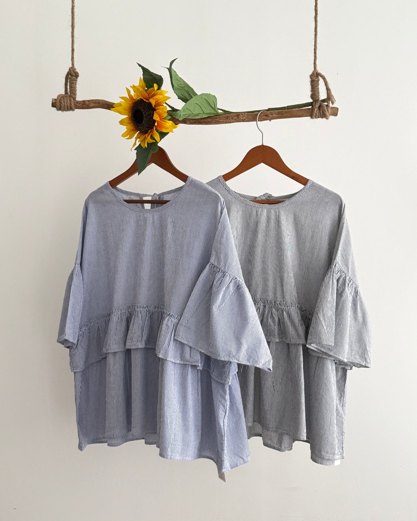 Step ruffle blouse