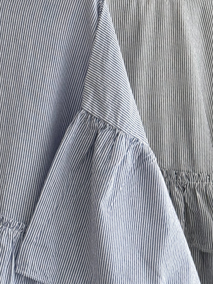 Step ruffle blouse