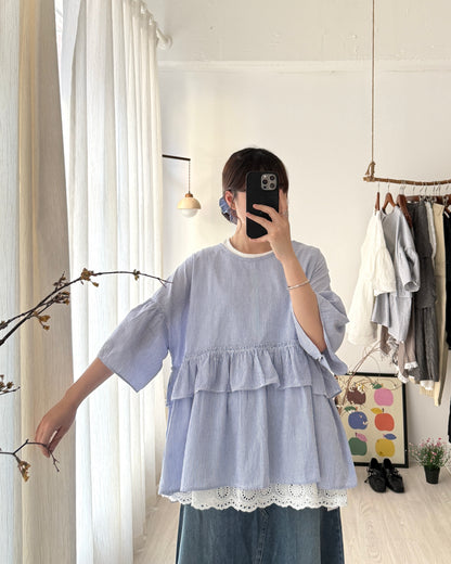 Step ruffle blouse